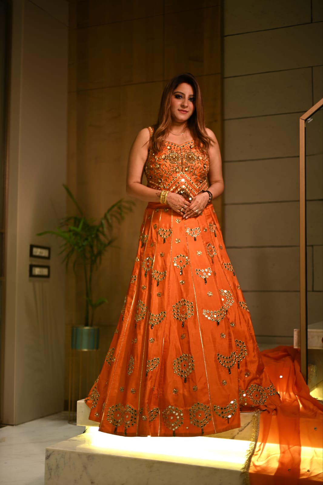 Vibrant Orange Kundan Embroidered Lehenga