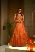 Vibrant Orange Kundan Embroidered Lehenga