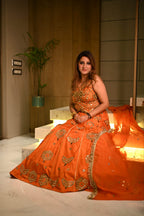 Vibrant Orange Kundan Embroidered Lehenga